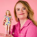 Model & Influencer Enya from the Netherlands holds Barbie's first doll with Down's syndrome