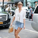 Taylor Swift arrives at Electric Lady Studios in a white peasant blouse, mini jean skirt and colorful woven handbag in New York City Pictured: Taylor Swift Ref: SPL8571557 270623 NON-EXCLUSIVE Picture by: Christopher Peterson / SplashNews.com Splash News and Pictures USA: 310-525-5808 UK: 020 8126 1009 eamteam@shutterstock.com World Rights, 